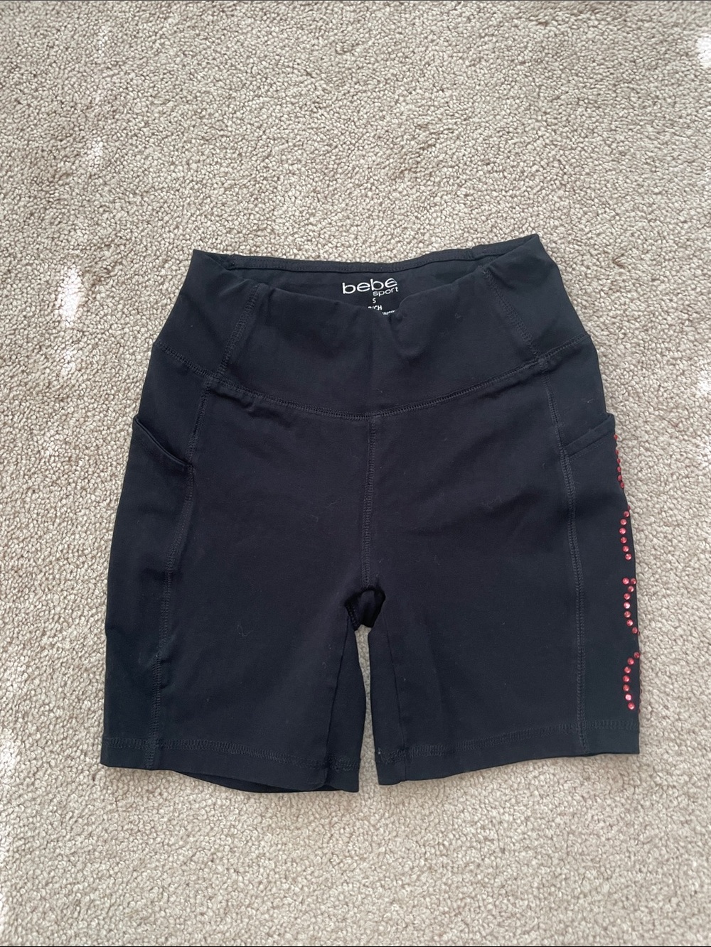 bebe Black High-Rise Bike Shorts with Side Stud Detail